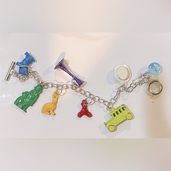 7 Original die cast Cracker Jack charms-early 80’s—updated on bracelet - Picture 1 of 1